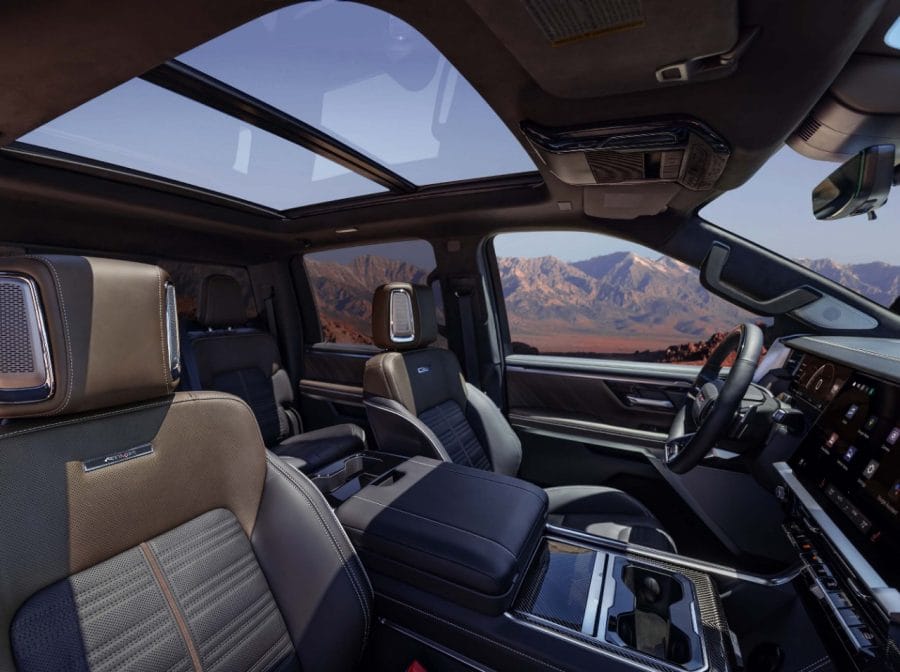 2027 GMC Sierra Denali Ultimate interior with panoramic sunroof and premium cabin