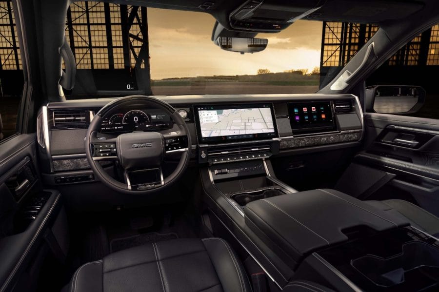 2027 GMC Sierra Denali Ultimate dashboard featuring large digital displays and premium interior